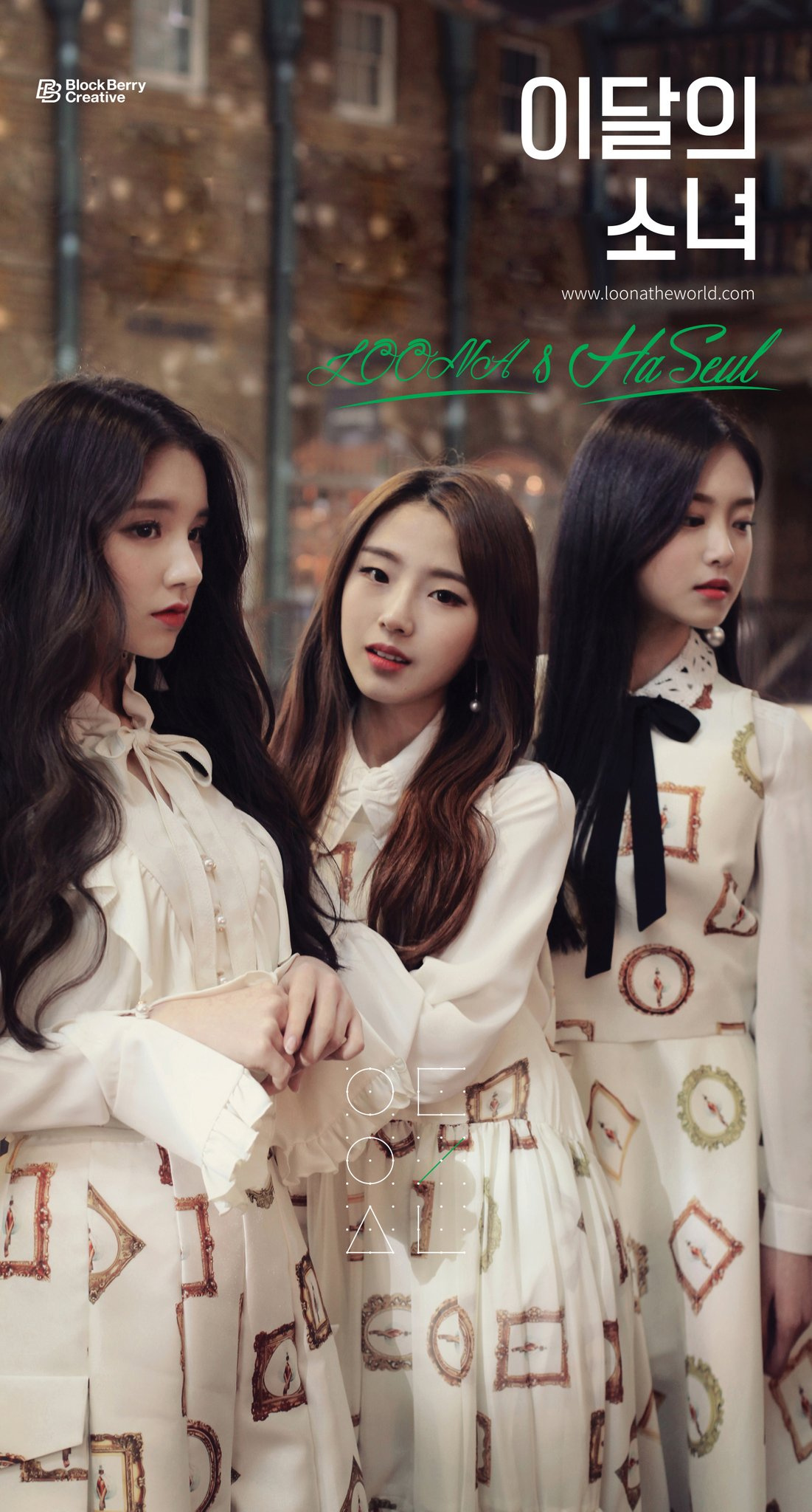 Heejin, Haseul, and Hyunjin wearing white dresses.